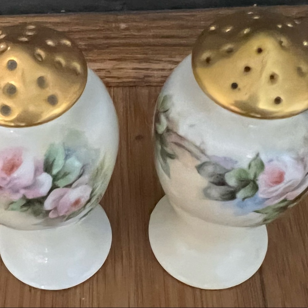 Antique porcelain salt and pepper shakers